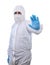 Epidemiologist in a protective suit shows prohibitory gesture with one hand isolated on white background