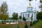 The Epiphany Church in Polotsk, Republic of Belarus with beautiful white walls and golden domes and crosses against the background