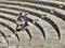 EPISKOPI, CYPRUS - 09/09/2018: Tourists in the roman theater at ancient Kourion.