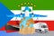 Equatorial Guinea logistics concept illustration. National flag of Equatorial Guinea from the back of globe, airplane, truck and