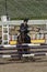 Equestrian show - horse stop at hurdle