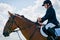 Equestrian sport. Girl child-rider show jumps
