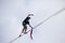 Equilibrist walking on the rope above the Vistula river during Vistula Fest