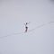 Equilibrist walking on the rope above the Vistula river during Vistula Fest