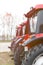 Equipment for agriculture, machines presented to an agricultural exhibition. Tractors outdoors