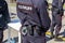 Equipment on the belt of Russian policeman. Text in russian: