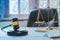 Equipment of the Hammer and Scale law office with contract papers on wood table. Lawyer Concept. Selective Focus