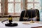 Equipment of the Hammer and Scale law office with contract papers on wood table. Lawyer Concept. Selective Focus