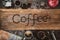 Equipment material about coffee beans. Top view with copy space for your text. Coffee message write on a wooden table. Concept