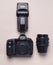 Equipment of the photographer. Digital camera, flash, lens. Top view, flat lay.
