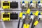 Equipment of radio base station close-up, blue and yellow optic patch cords.