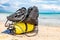 Equipment of a scuba diver, an oxygen balloon lies on the beach. Diving, equipment, fins, balloons, masks
