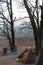 Equipped camp in the forest. Camping tent and portable chairs and aluminum table. Cold autumn day. concept of vacation, vertical