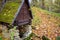 Equipped holy spring in a forest area. A spring in the wilderness consecrated by the Russian Orthodox Church