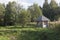 Equipped source and gazebo beside the road to the village Gorodischna, Nyuksensky District, Vologda Region