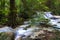 Erawan Waterfall idyllic in rain forest  and is deep forest