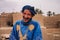 Erfoud, Morocco - Oct 17, 2019: Old Berber man living in the moroccan mountains in Ksar Maadid near Erfoud