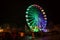 Erfurt, Germany. December 22, 2018. Bright Ferris wheel in motion in the city center. Christmas time. Blurred, abstract