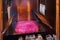 ERGAMO, ITALY - MAY 22, 2019: Place for priest in the old wooden confessional in the Catholic Church of Sant Agata nel Carmine in