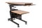 ergonomic desk with adjustable height, position, and tilt