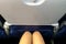 Ergonomic while Travel Concept, Women Leg with The Small Space of Plane Seat on Low Cost Aircraft