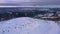 Erial view of ski resort Hafjell in Norway with skiers going down the snowy slopes in winter