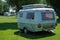 Eriba Touring GT small caravan - trailer parked on campsite.