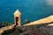 Ericeira Milreu Fort castle towers with turquoise water, in Portugal