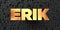 Erik - Gold text on black background - 3D rendered royalty free stock picture