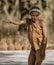 Erindi, Namibia - July 19, 2018: A native bushman gives a farewell dance to wish good hunting to the photographers