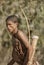 Erindi, Namibia - July 19, 2018: A native bushman gives a farewell dance to wish good hunting to the photographers