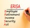 ERISA symbol. Concept words ERISA employee retirement income security act on white paper. Beautiful brown background. Business