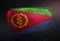 Eritrea Flag Made of Metallic Brush Paint on Grunge Dark Wall
