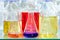 Erlenmeyer flasks with chemical solutions