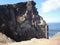 Eroded eruptive structures shaping a cliff on Madeira