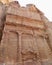 Eroded facade of the tomb in Petra, Jordan