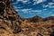 Eroded rocky cliffs with carved temple in Petra