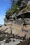 Eroded sandstone cliffs on the shoreline of Pacific Ocean