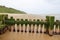 Eroded wooden groyne on sand beach