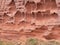 Erosion in the red sandstone coastal cliffs at Budleigh Salterton, Devon, UK. Geology on the Jurassic coast.