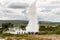 Erupting of Strokkur Geyser in the Haukadalur geothermal area, Iceland