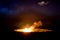 Erupting volcano at night in Volcanoes national park, Hawaii