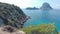 Es Vedra, the magical island of Ibiza, a tourist destination for hippies and explorers. breathtaking view off the coast of Cala D