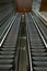 Escalators in an empty shopping mall in Singapore with motion blur effect