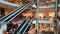 Escalators in modern shopping mall, Sydney, Australia