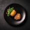 Escalope De Veau On Black Smooth Round Plate, French Dish. Generative AI