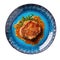 Escalope De Veau On A Blue Abstraction Round Plate, French Dish. Generative AI