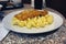 Escalope with pasta on a plate