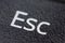 Escape esc black button, closeup