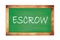 ESCROW text written on green school board